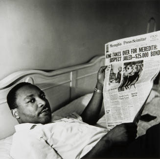 Dr. King Reading the Memphis Press-Scimitar in the Lorraine Motel